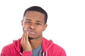 A man experiencing tooth pain