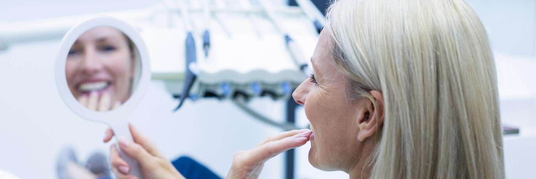 A woman after after getting Dental Crowns in Maple Ridge, BC