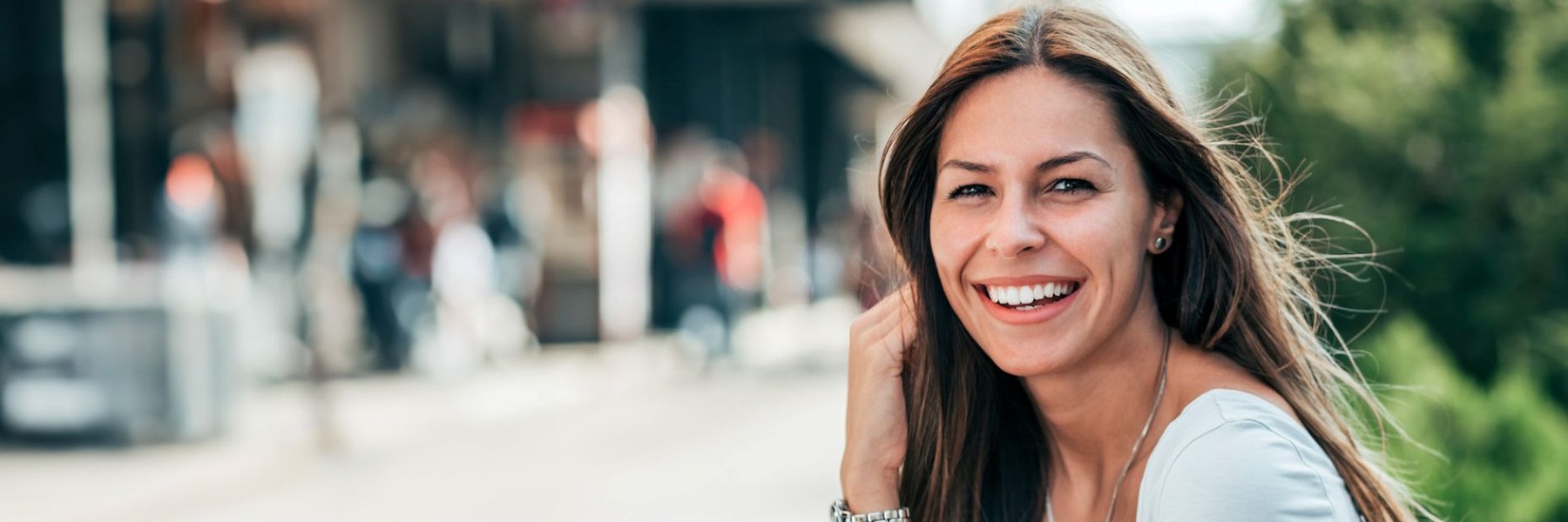 A woman smiling after a seamless cost effective dental visit in Maple Ridge, BC