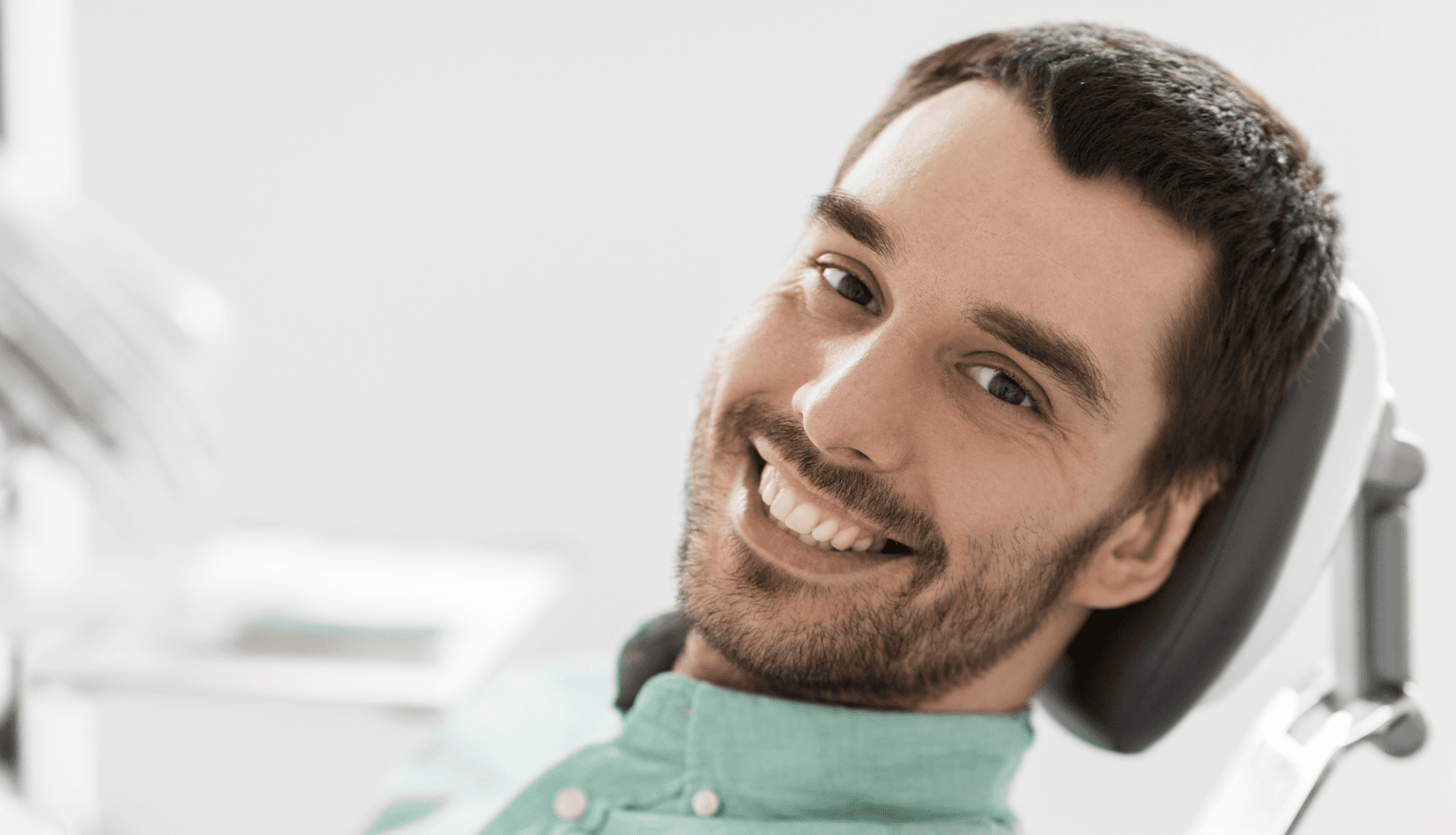 Man in a dentist's chair | tooth filling Maple Ridge