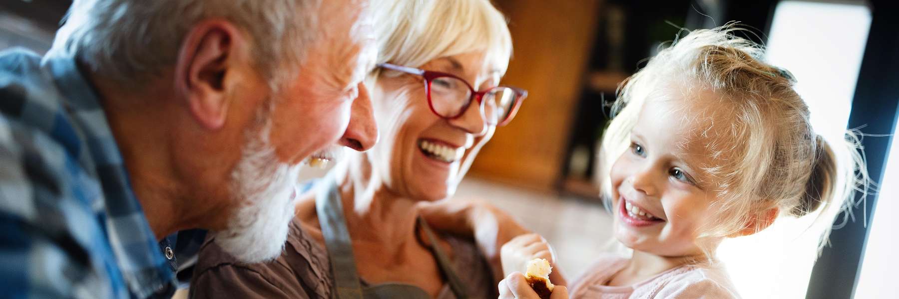 An elderly couple with a toddler in Maple ridge BC
