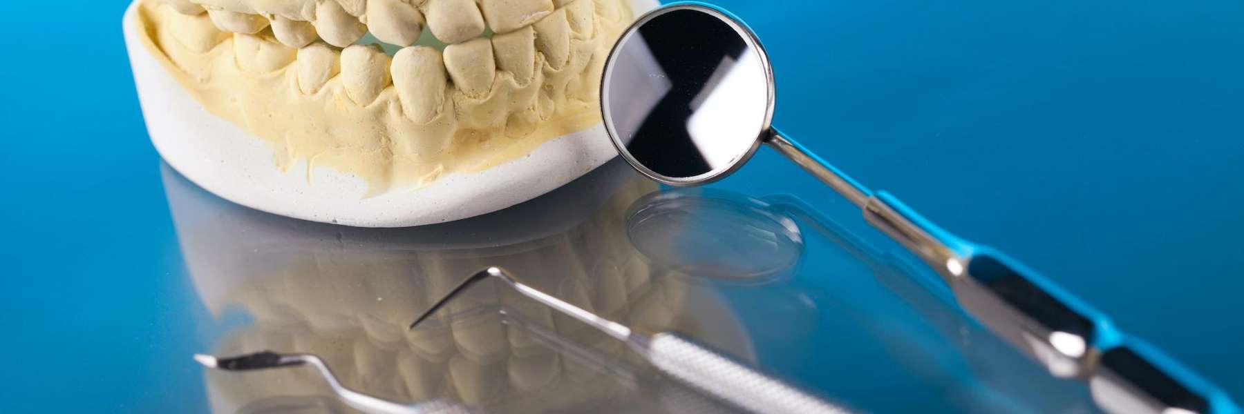 A dental mold and teeth cleaning tools