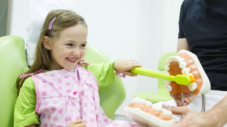 A cute girl at a dentist in Maple Ridge BC
